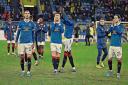 The Rangers players acknowledge the club's supporters after beating Borussia Dortmund 4-2 in Germany.