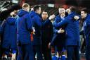 Rangers boss Giovanni van Bronckhorst and players celebrate after knocking out Red Star Belgrade and progressing to the Europa League quarter-finals.