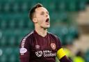 Lawrence Shankland celebrates scoring a late winner for Hearts against Hibs