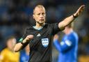 Willie Collum referees a game at Ibrox