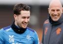 Rangers winger Scott Wright shares a laugh with Ibrox manager Philippe Clement in training at Auchenhowie
