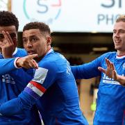 Malik Tillman (left) celebrates his goal with James Tavernier and Todd Cantwell