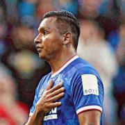 Morelos beats his chest, leaving the Ibrox turf one last time