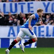 Scott Arfield runs onto the Ibrox pitch for Rangers for the final time