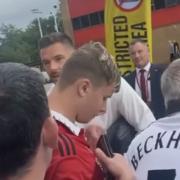Jack Butland greets Manchester United fans outside of Old Trafford