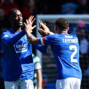 Rangers' Abdallah Sima celebrates with James Tavernier