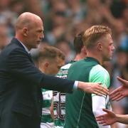 Philippe Clement shakes the hands of Celtic players after Saturday's game